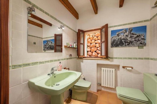 One of 3 bathrooms