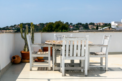 Further terrace with outdoor dining area