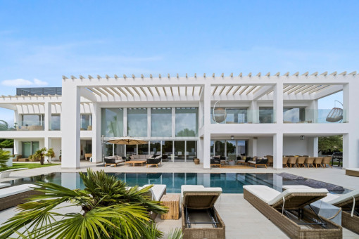 The pool is surrounded by a terrace