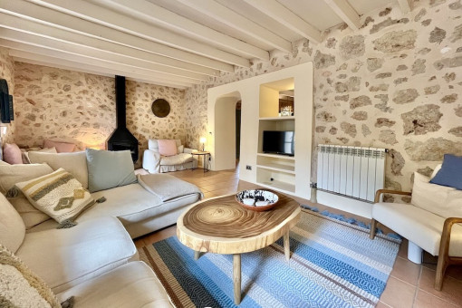 Natural stone walls and wooden beams give the property a special aura