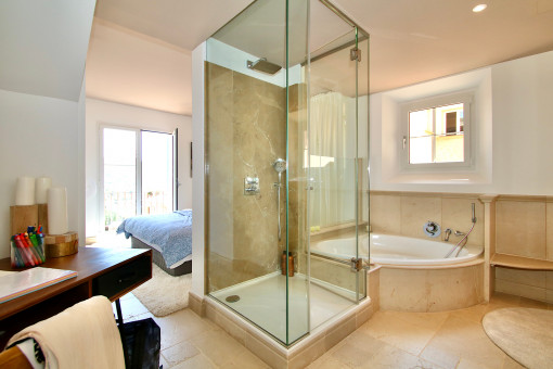 Bathroom with shower and bathtub