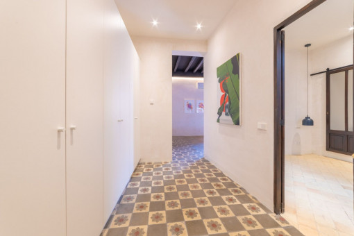 Hallway with fitted wardrobes