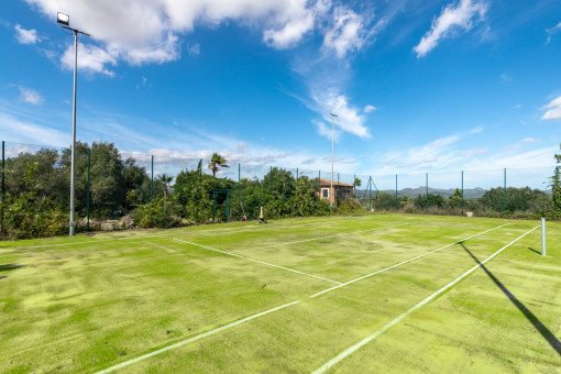 Artificial turf tennis court