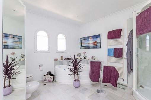 Bathroom with bathtub and shower