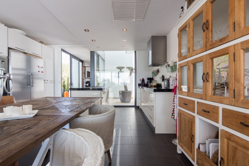 Dining area with kitchen views