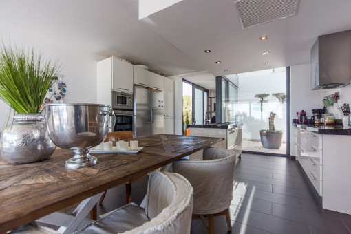 Elegant dining area with kitchen