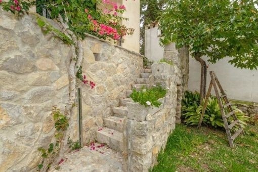 Staircase leads from the garden to the finca