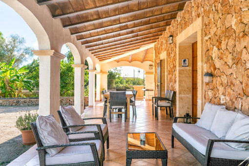 Idyllic, covered terrace with sitting area