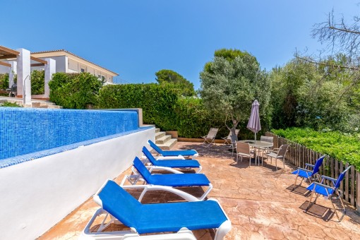 Lounge area beside the pool