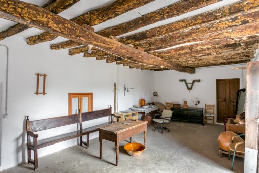 Room with wooden ceiling beams