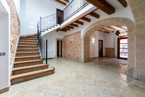 Traditional entrance hall with stone arch