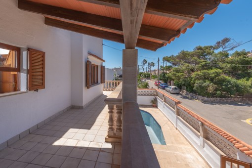 Covered balcony on the upper floor