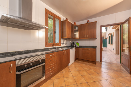 Spacious kitchen with access to the outside