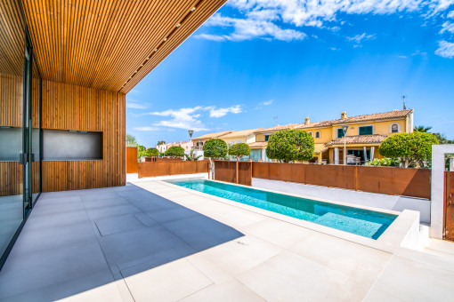 Elegant terrace with pool views