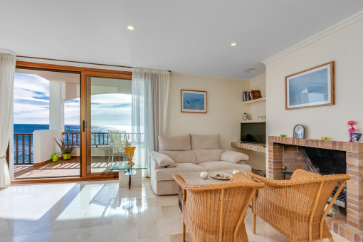 Sea view living area with fireplace