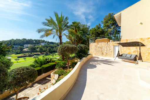 Sunny terrace overlooking the golf course