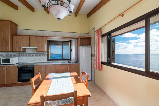 Dining area and kitchen with panoramic views