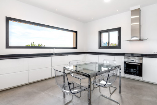 Modern kitchen with dining area