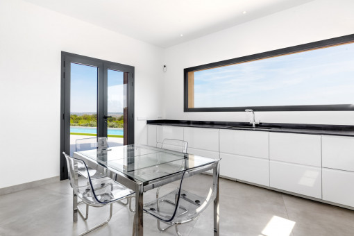 Modern kitchen with dining area