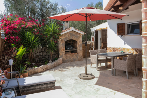 Outdoor dining area with barbecue