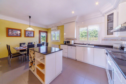 Open kitchen with dining area