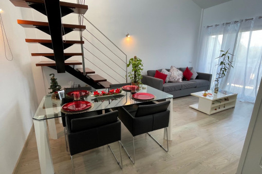 Living and dining area with direct access to the balcony