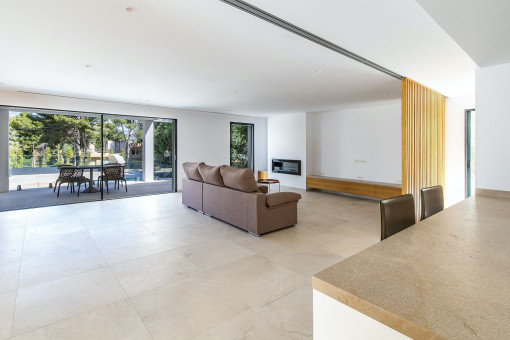 Living area with access to the pool terrace