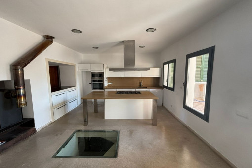 Kitchen and access to the wine cellar