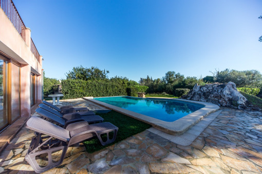 Lounge area beside the pool