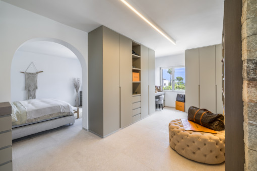 Bedroom with walk-in wardrobe