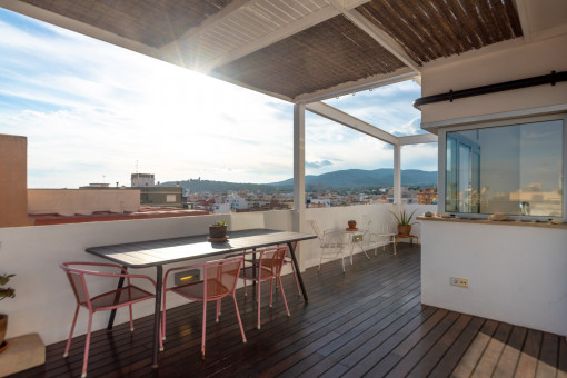 Covered terrace with mountain views