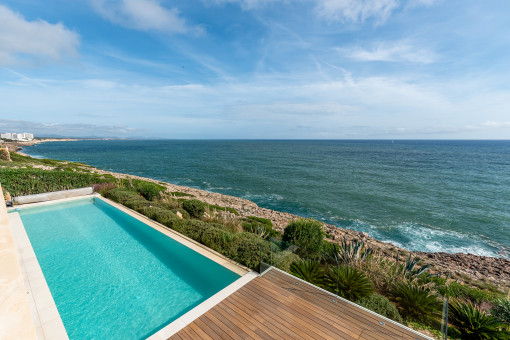 Pool area with sea views