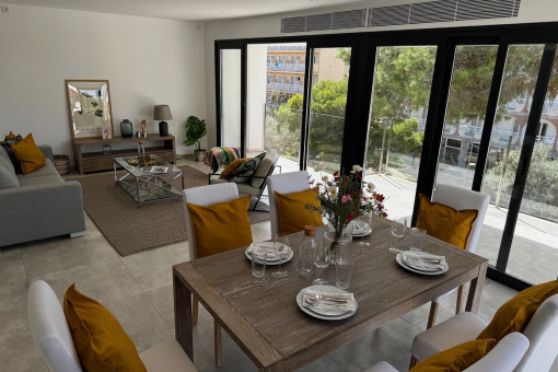 Light-flooded living and dining area