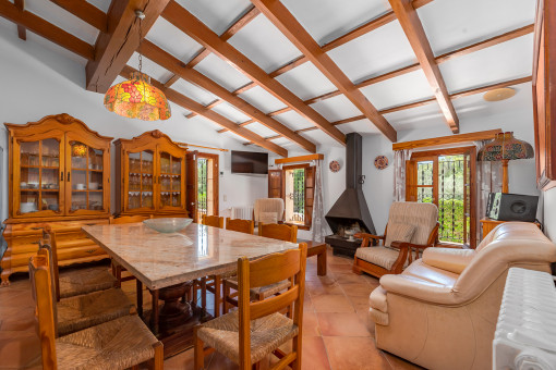 Living and dining area with fireplace